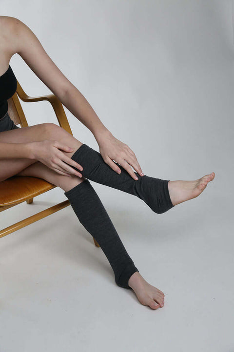 Merino wool leg warmers on woman