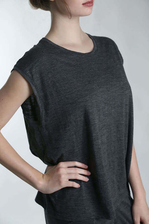 Woman in merino wool sleeveless top